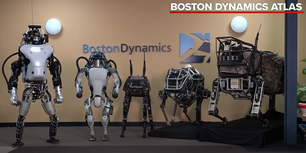 Picture of Tesla Bot vs Boston Dynamics Atlas! (Watch their reveals)