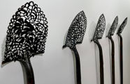 Picture of Inscribed Lace Patterns Defy Expectations in Cal Lane's Plasma-Cut Steel Tools and Industrial Objects